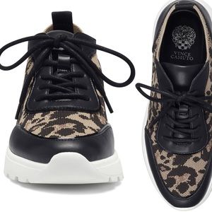 Size 6.5 Vince Camuto tennis shoes. Soft stretch material around ankle.